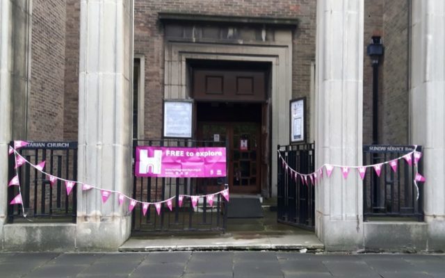 The front of the church building decorated with Heritage Open Days banners