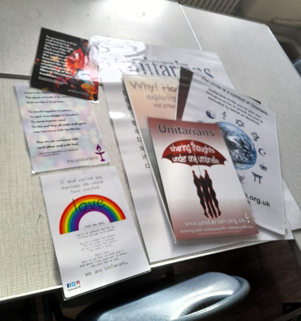 Unitarian posters on a table.